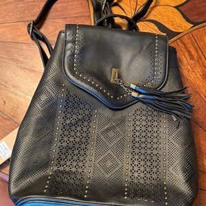 Chic Black Perforated Backpack